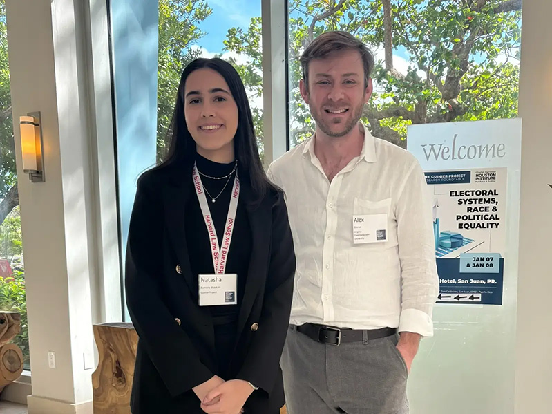 VCU student Natasha Romero Moskala stands next to Alex Keena, Ph.D., associate professor of political science