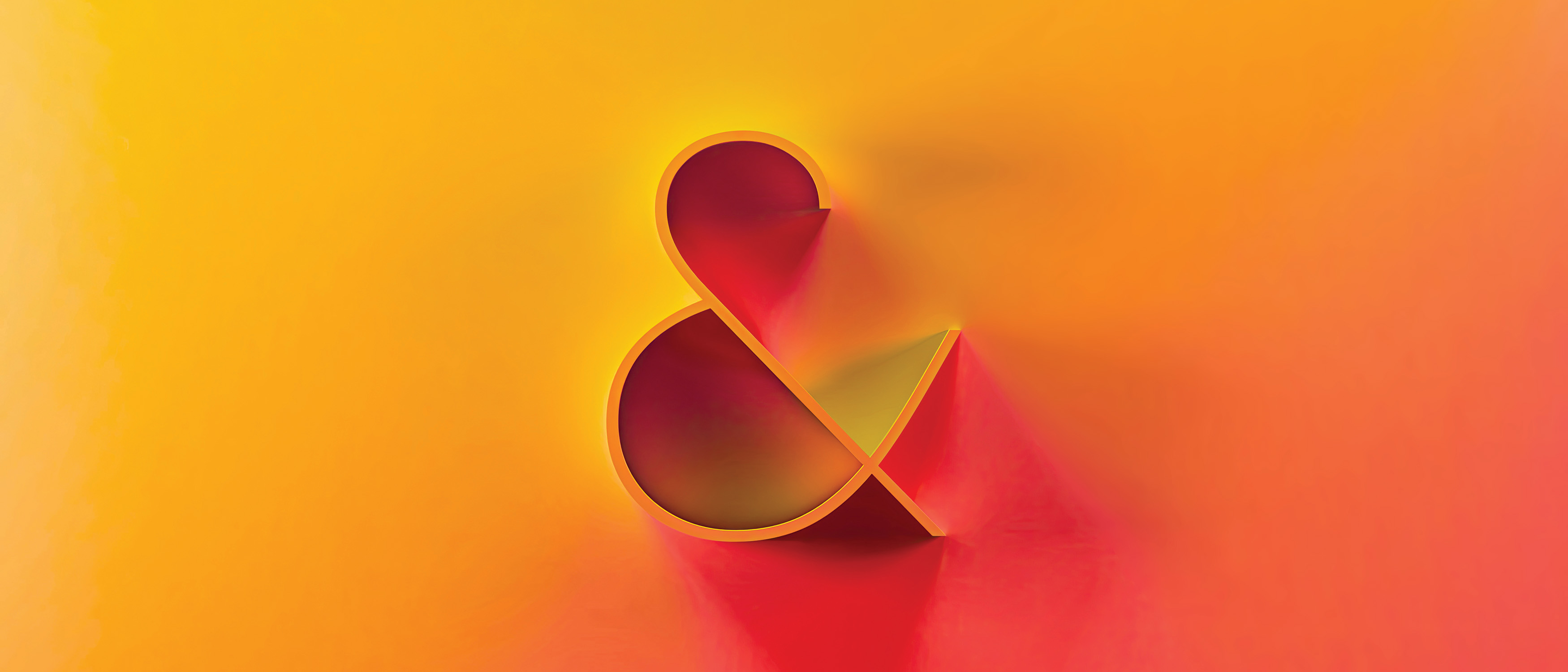 A stylized, three-dimensional ampersand symbol centered on a gradient background that shifts smoothly from warm yellow on the left to vibrant orange and coral-red on the right.
