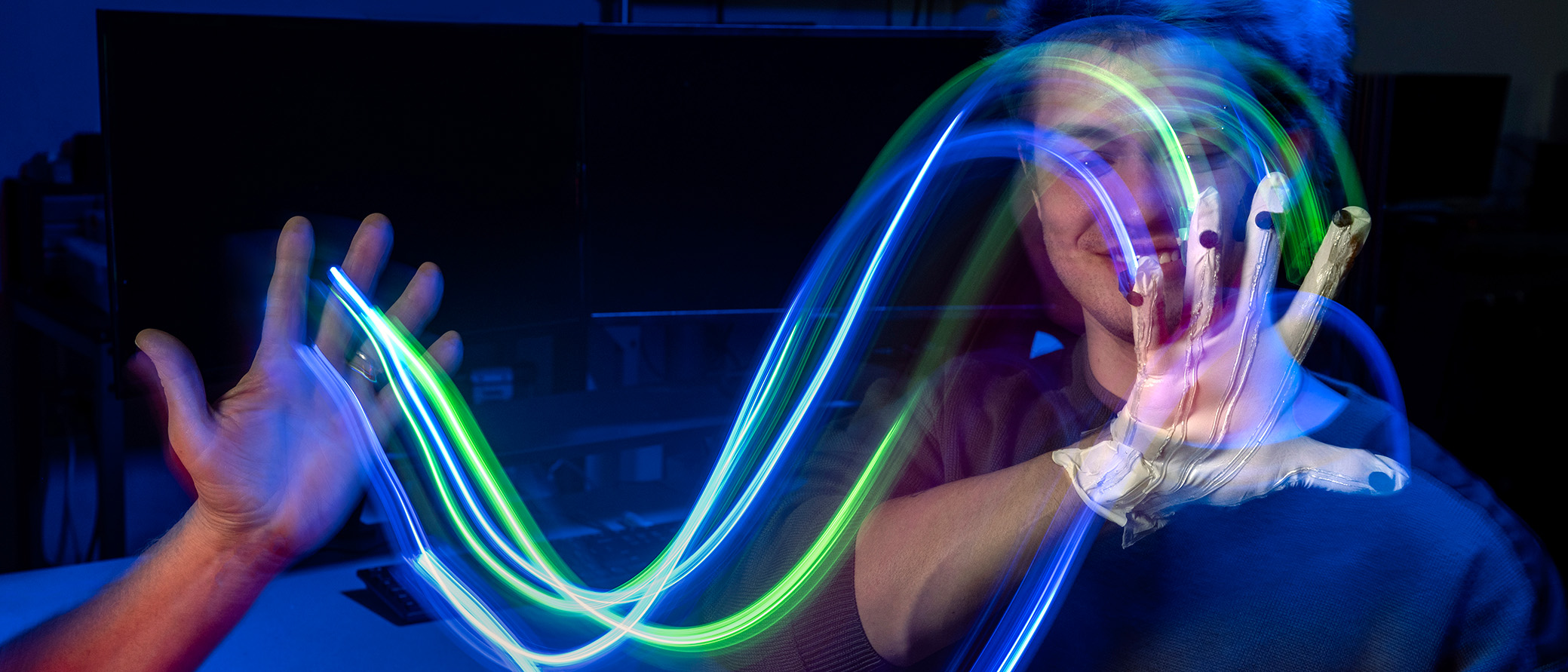 VCU student demonstrating Wearable Technology Glove