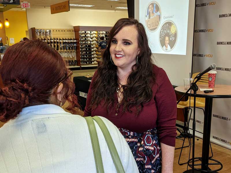 chelsea williams having a discussion with another person at barnes and noble at v.c.u.