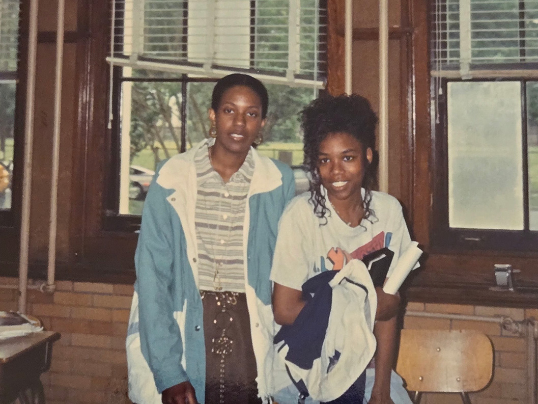 Adriene Marshall and another student stand together in a classroom